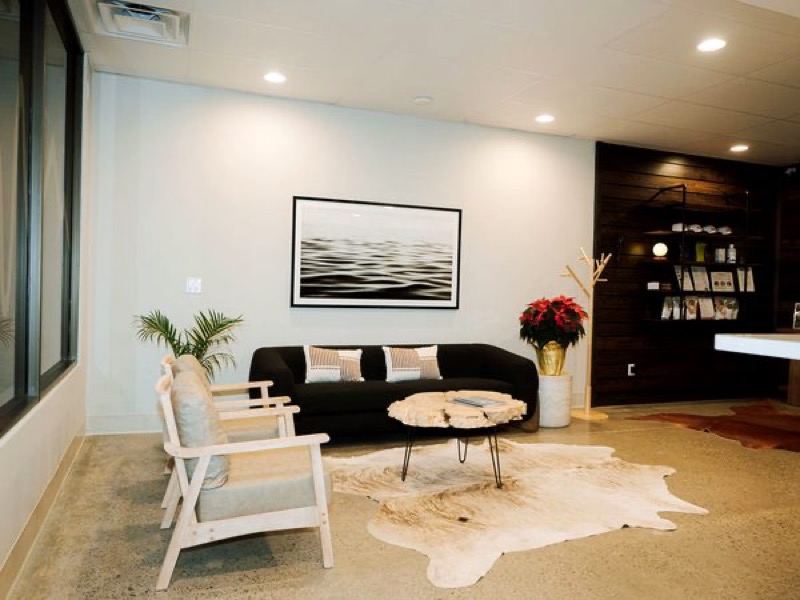 Modern waiting area with natural light and contemporary furnishings